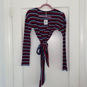 Free People striped, front tie top. Size medium.
